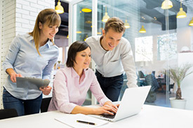 Businessteam in conference with laptop
